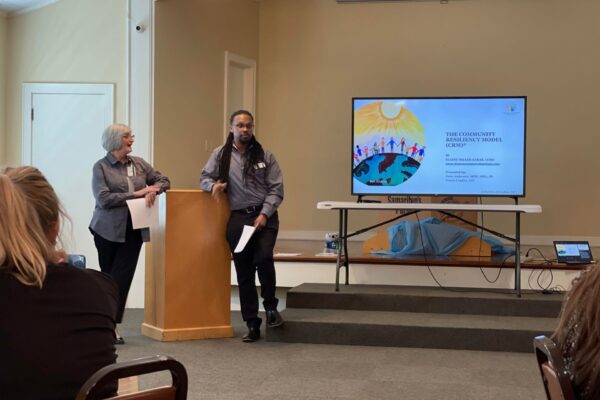 Joan Anderson and Travis Crafter teach community resiliency model